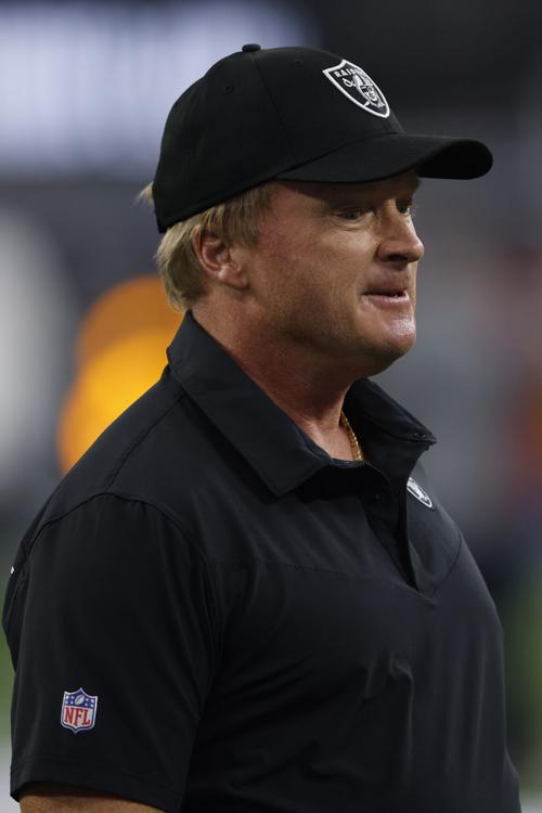In this file photo, Las Vegas Raiders head coach Jon Gruden looks on before the start of play against the Los Angeles Chargers at SoFi Stadium on Oct. 4, 2021, in Inglewood, California.