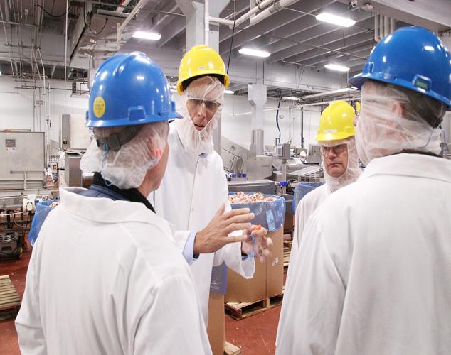 Feenstra and Holt at Monogram Quality Foods