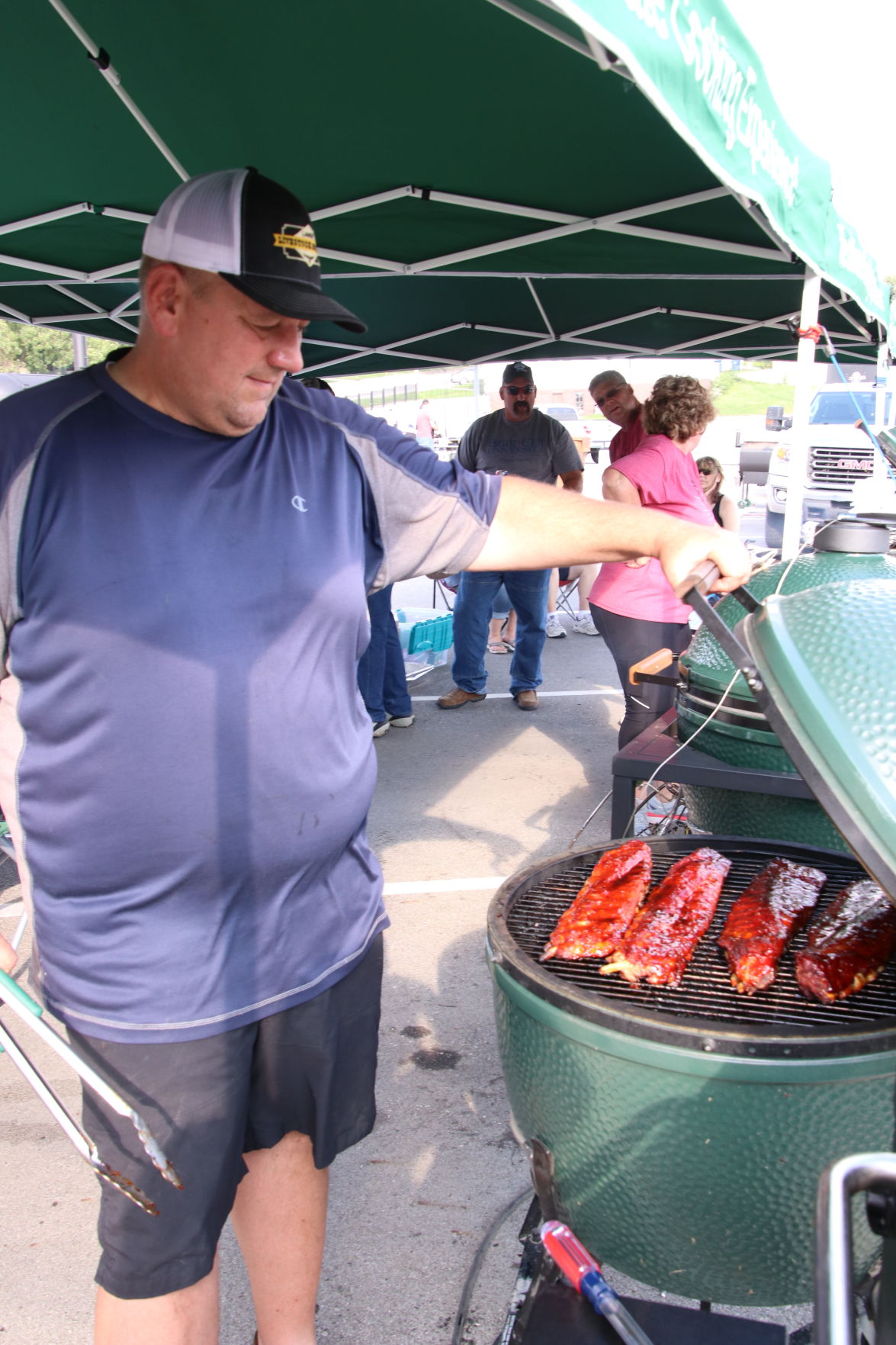 Scenes from the amateur BBQ contest at Tri City BBQ Fest in Denison