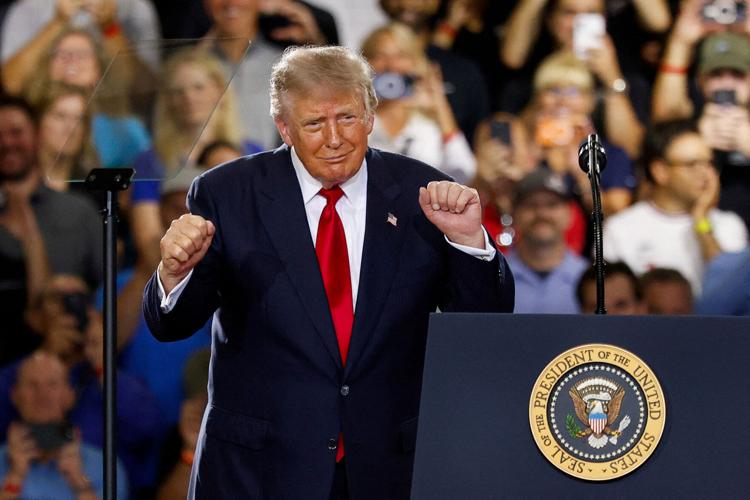 FILE PHOTO: U.S. President Donald Trump visits Michigan