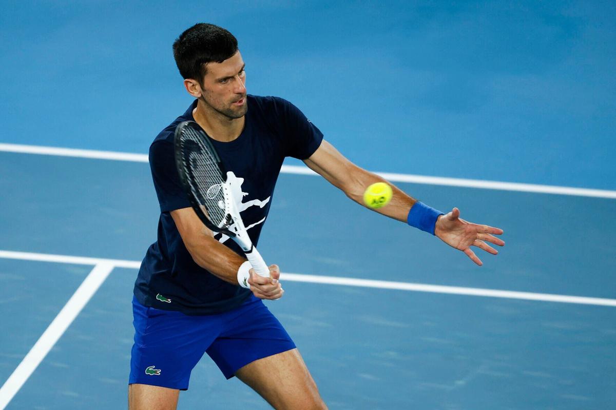 Novak Djokovic of Serbia plays a forehand during a practice session ahead of the 2022 Australian Open at Melbourne Park on Jan. 14, 2022 in Melbourne, Australia.