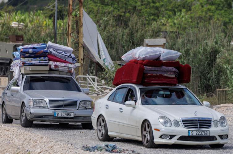 Displaced people make their way back to their homes in southern Lebanon
