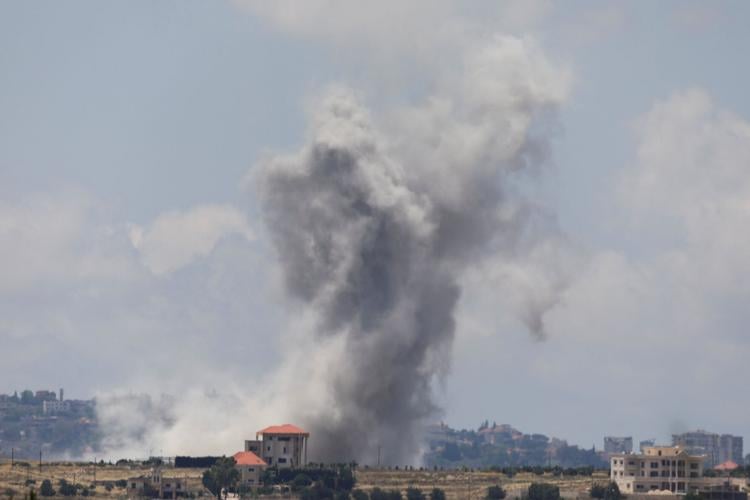 Smoke billows from southern Lebanon following an Israeli strike, as seen from Marjayoun