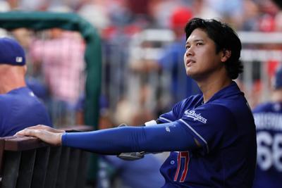 Los Angeles Dodgers two-way player Shohei Ohtani (17) looks on from the dugout during the fifth inning Philadelphia Phillies at Citizens Bank Park on Jul 22, 2026.