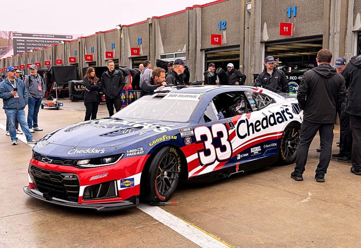 Kyle Busch's car is wheeled out of the inspection garage at Charlotte Motor Speedway on Saturday, May 23, 2026. Following Busch's shocking death, his RCR car was renumbered from 8 to 33 and will be driven by Austin Hill in the Coca-Cola 600.