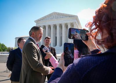 Rep. Thomas Massie (R-KY) speaking to media as protestors gather outside the Supreme Court as the Justices hearing arguments in Monsanto Company v. Durnell, on April 27, 2026, in Washington, DC. The Supreme Court will decide whether to block thousands of