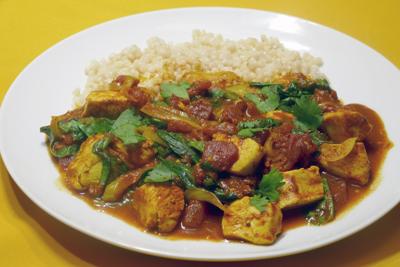 Chicken seasoned with cinnamon, cumin, and turmeric creates a fragrant, savory Moroccan-inspired dish.