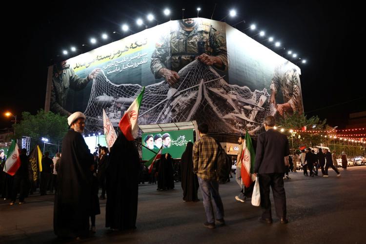 A billboard with a graphic design about the Strait of Hormuz on a building in Tehran
