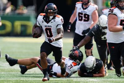 Running back Anthony Hankerson of the Oregon State Beavers carries the ball during the first half of the game against the Oregon Ducks at Autzen Stadium on Sept. 20, 2025, in Eugene, Ore..