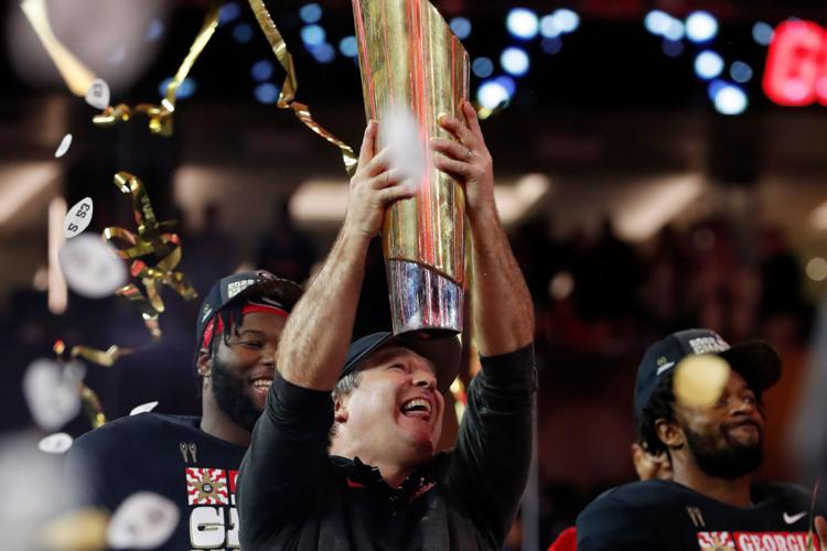 Georgia coach Kirby Smart celebrates after winning the national championship against TCU