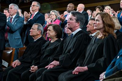 From left, Supreme Court Chief Justice John G. Roberts Jr., Justice Elena Kagan, Justice Neil Gorsuch and Justice Amy Coney Barrett watch as President Donald J. Trump delivers the first State of the Union address of his second term to a joint session of Co
