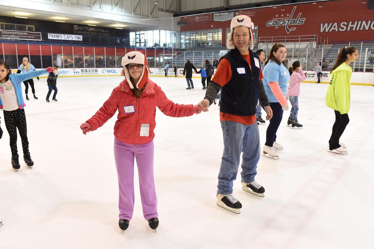 Arlington families spend free fun time at Adaptive Ice Skate Afternoon