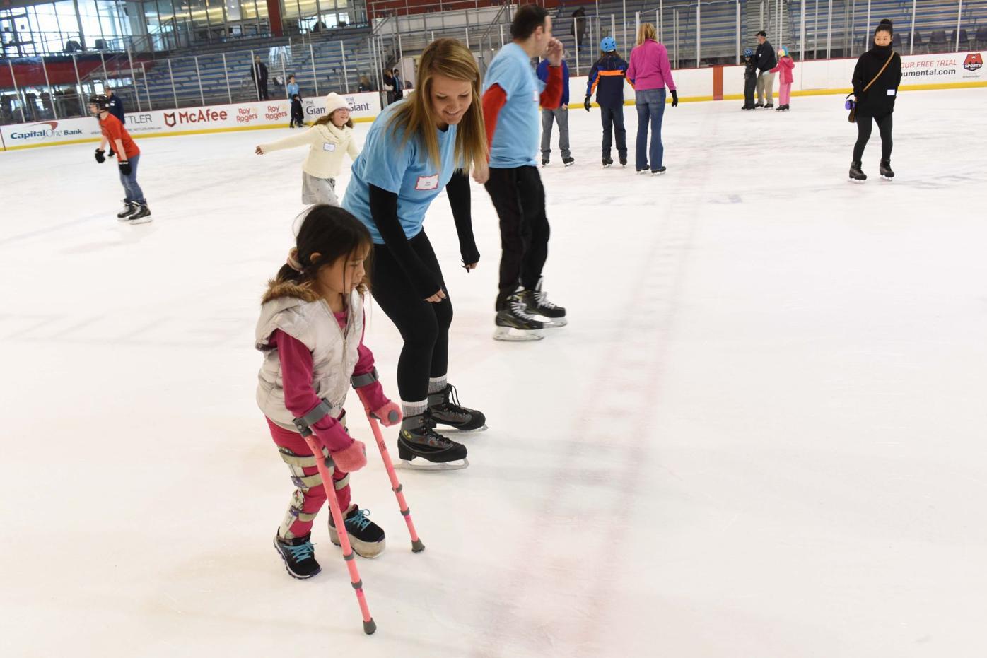Arlington families spend free fun time at Adaptive Ice Skate Afternoon