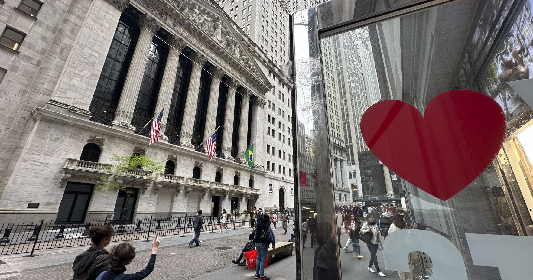 Wall Street drifts higher; Dow has its first close above 40,000