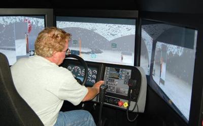 Simulator lets snow plow drivers learn off the road | News | dcourier.com