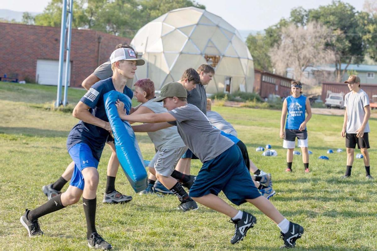 Sharing The Experience A Youth Football Camp Sports Deltacountyindependent Com