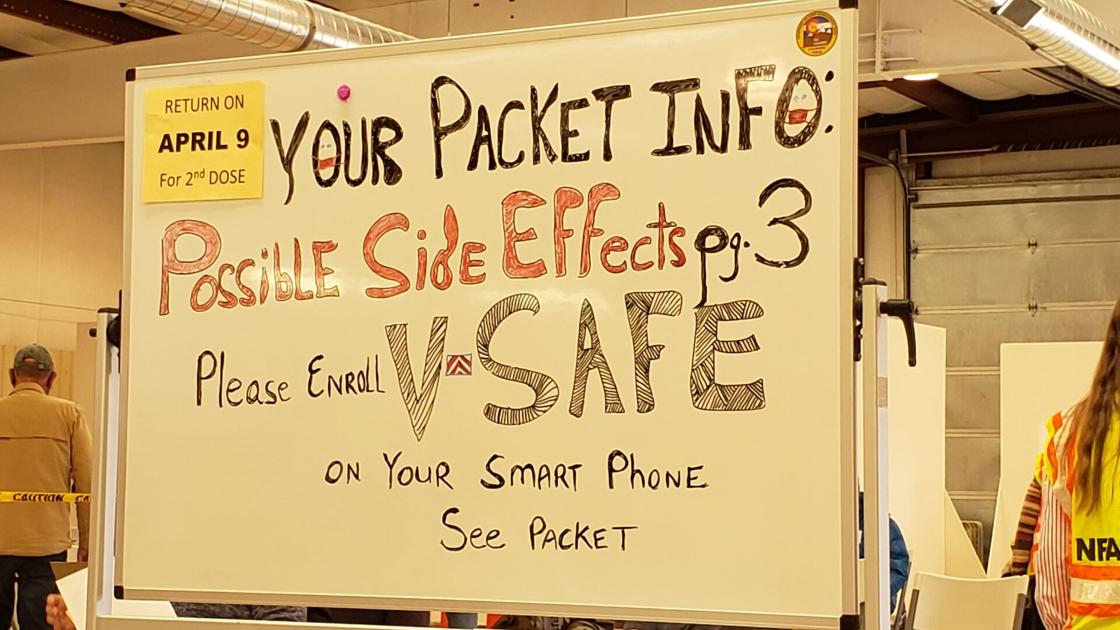 Sign at North Fork COVID-19 vaccination pod ...