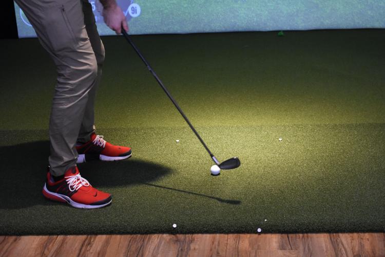 No raincoat needed New Albany business lets golfers play yearround