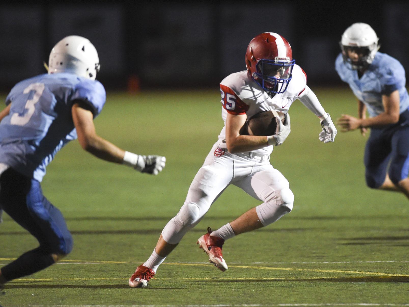 Prep Football Warriors Run Through Spartans Football