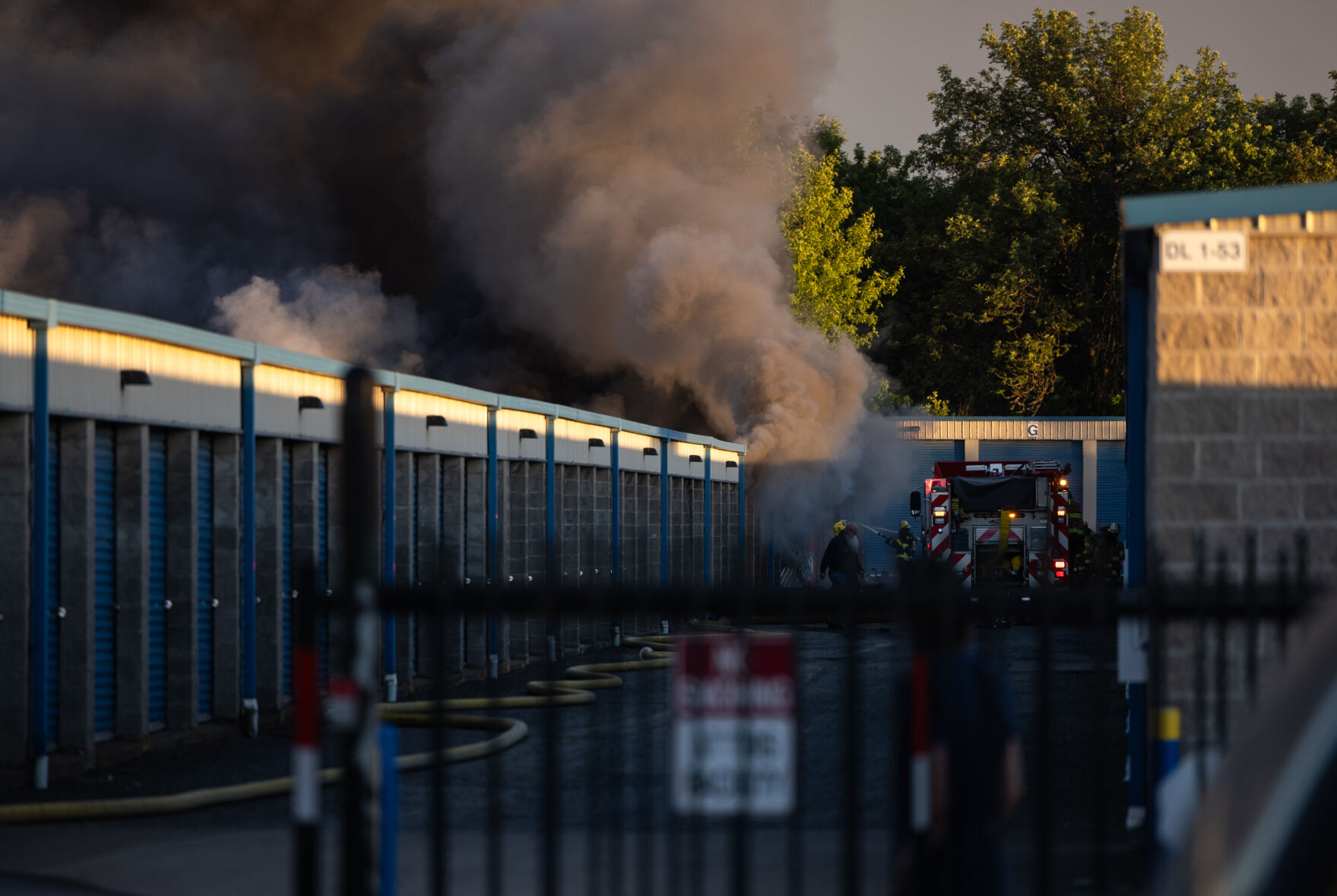 two-alarm blaze draws six departments in storage unit fire