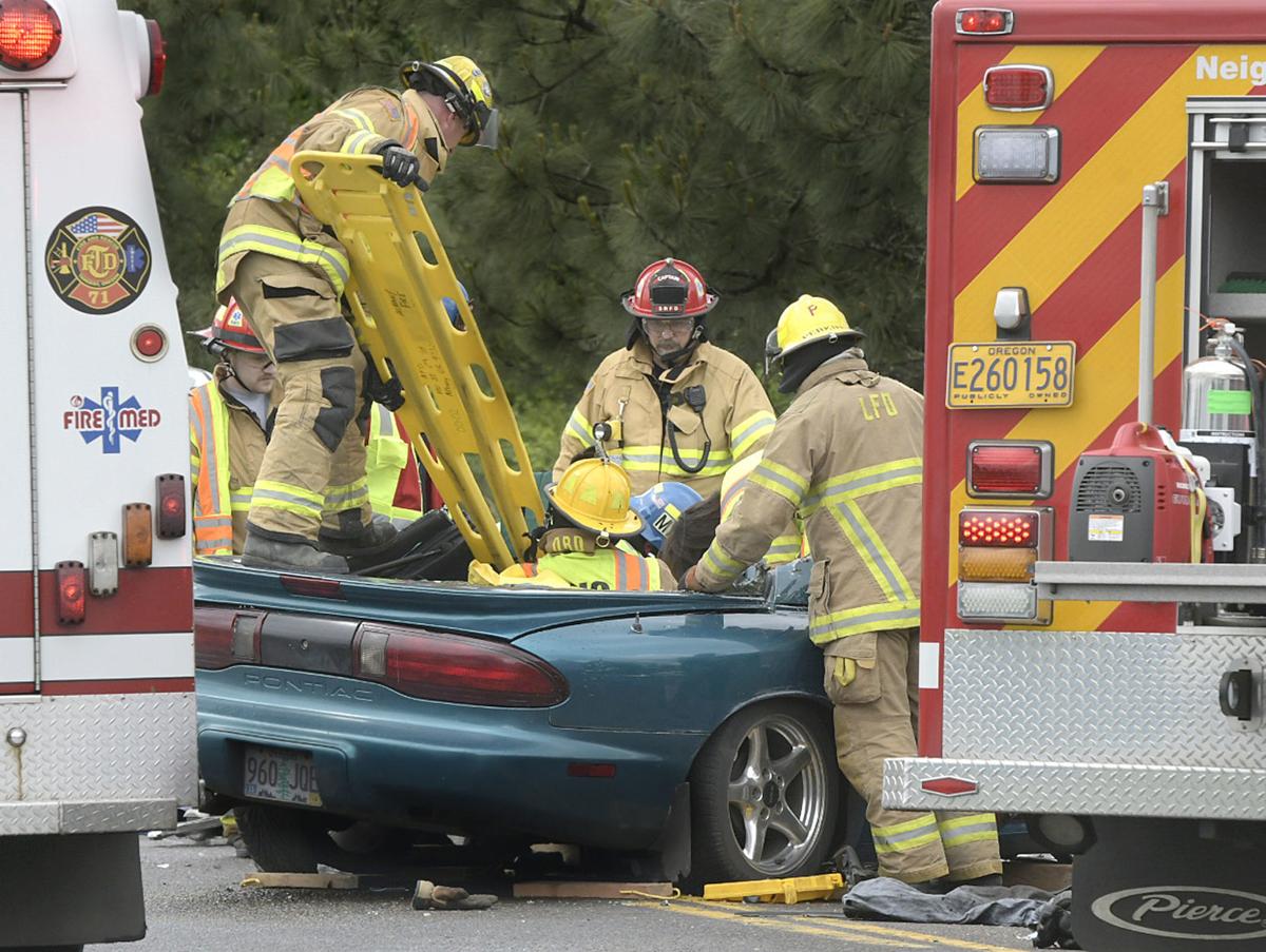 Gallery Firefighters extricate driver in Brewster Road Collision