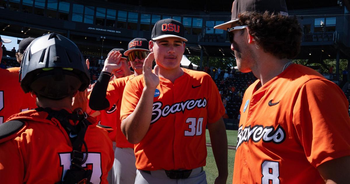 Oregon State pitch Trey Morris celebrates with teammates after helping defeat Washington State on day three at the NCAA Eugene (copy)
