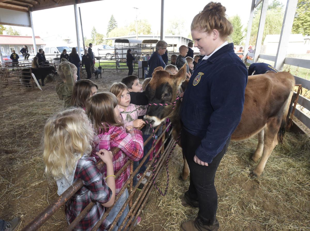 Kids, animals mix at FFA Day Education