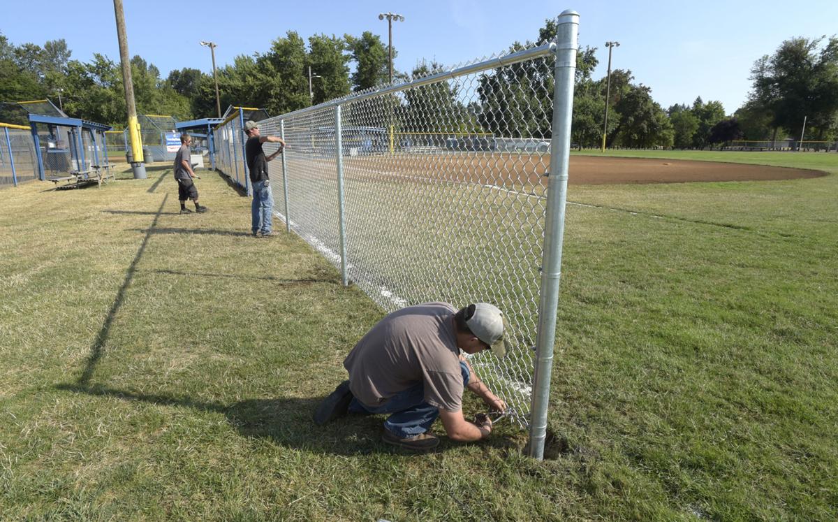 Lowe's provides new fencing at softball fields Local