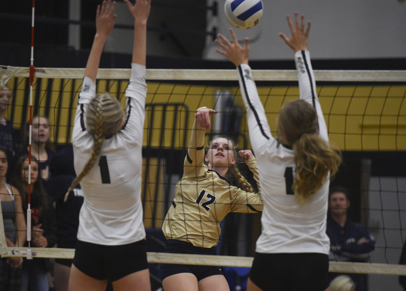 Prep volleyball: Resilient Bulldogs sweep Titans