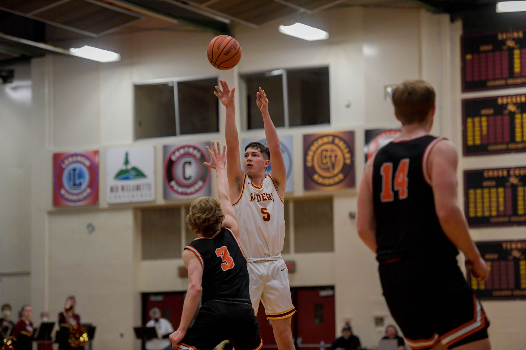 High school boys basketball Raiders right the ship, advance to state tournament