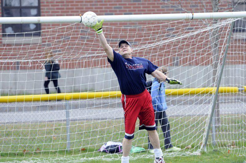 Teachers take on students in soccer match Sports