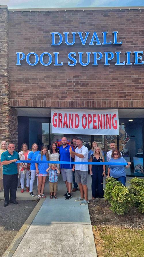 Duvall Pool Supplies cuts ribbon