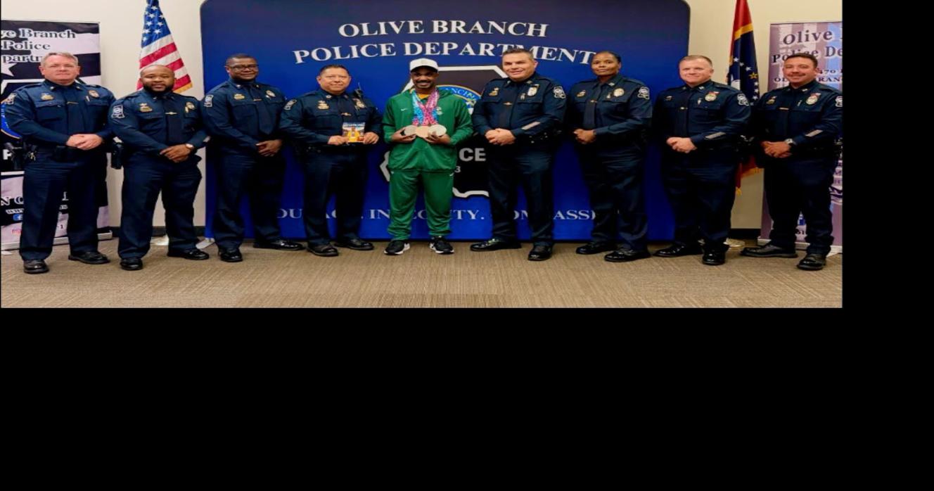 Olive Branch Police welcome home Special Olympics champion