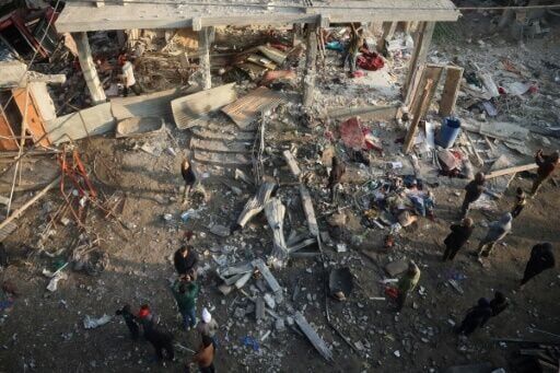 Gaza rescuers say Israeli strikes kill 58, hit flour trucks | National ...