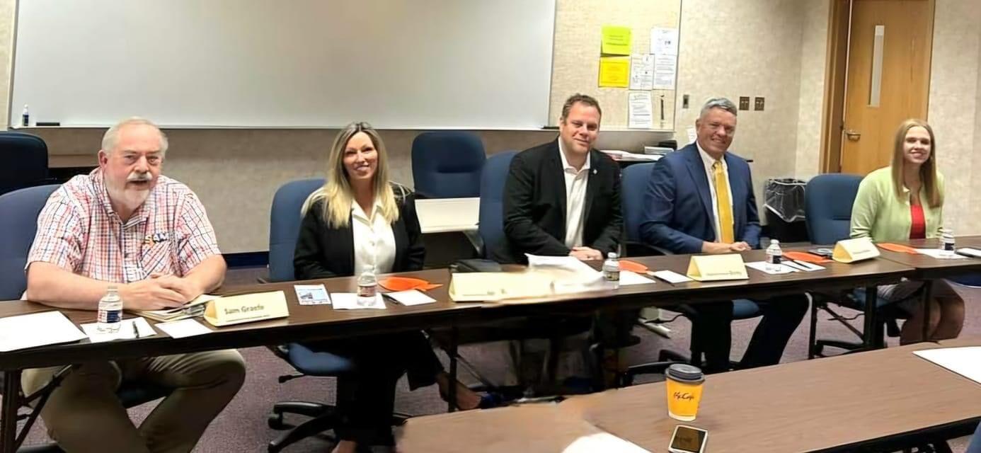 Photo Retired teachers visit with new, existing locally elected