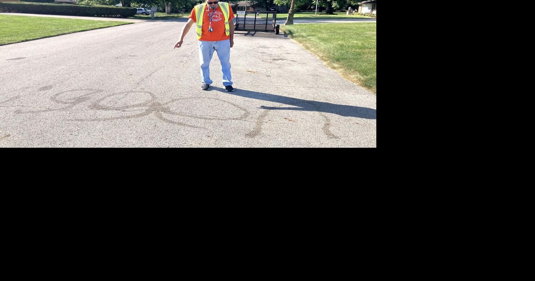 Racist graffiti scrawled on street pavement outside home of Indiana city councilman