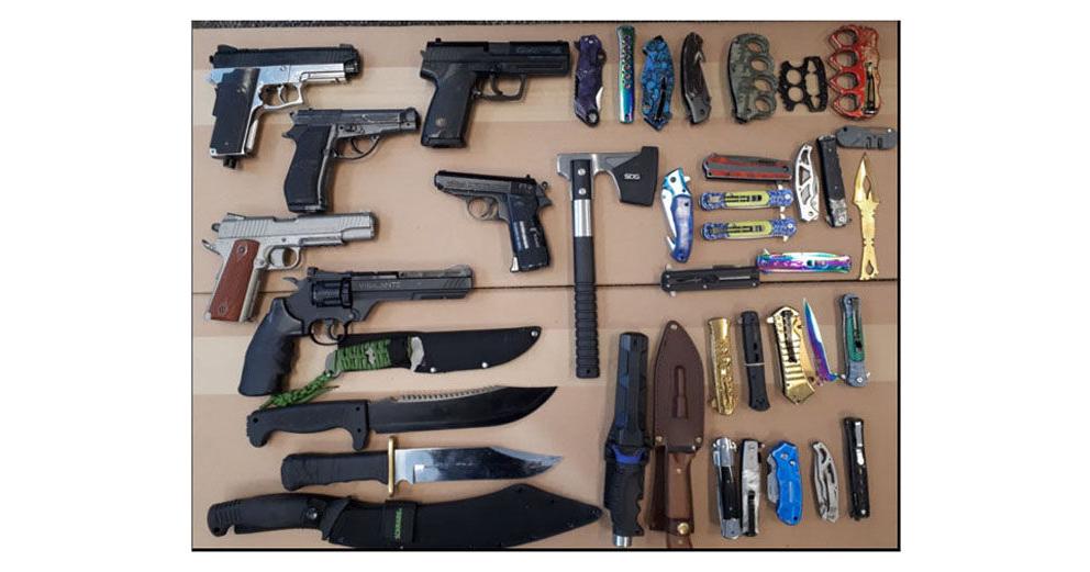 Stash of weapons, $90,000 in drugs and cash seized in Oshawa raid