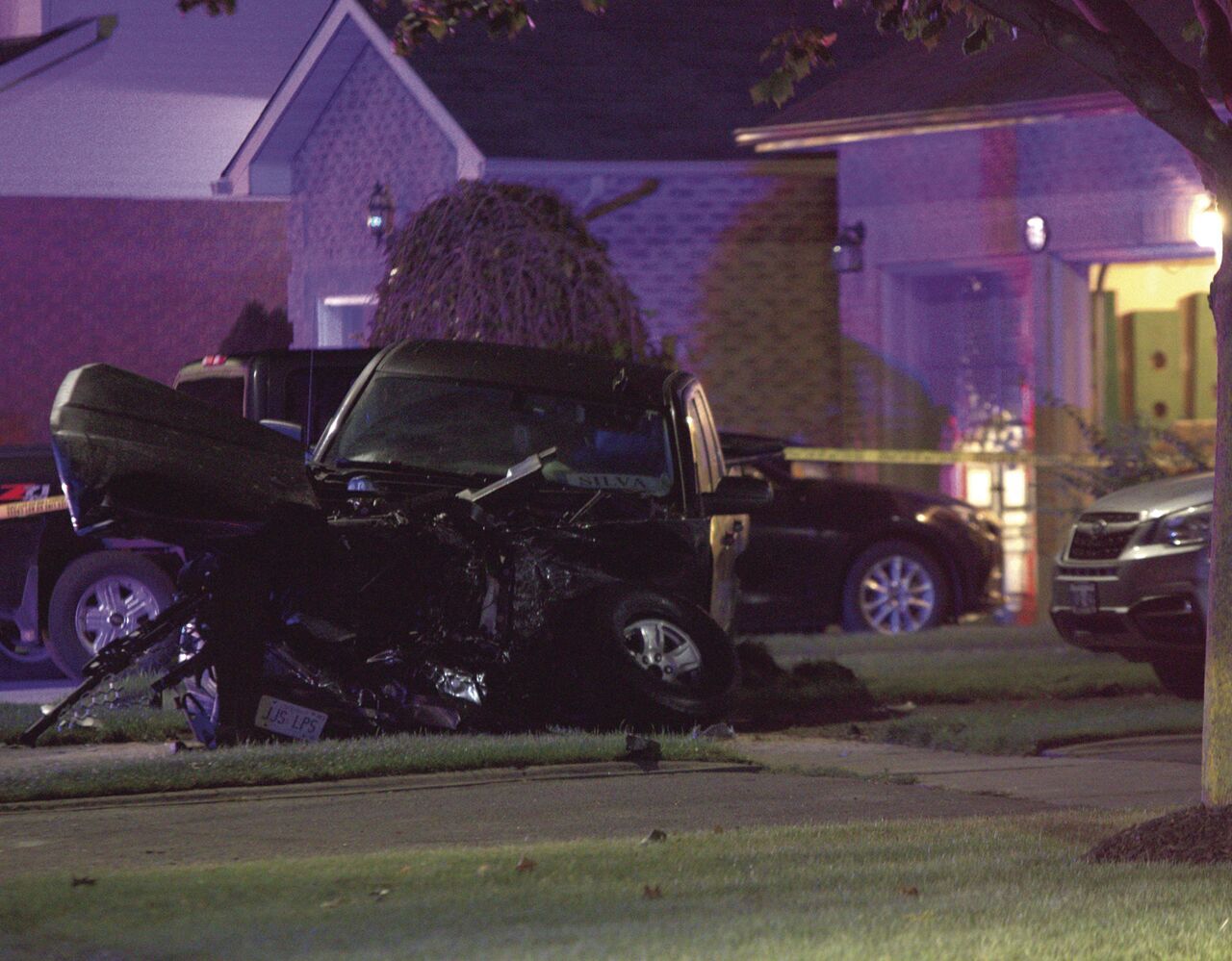 Oshawa man dead after SUV collides with parked pickup truck