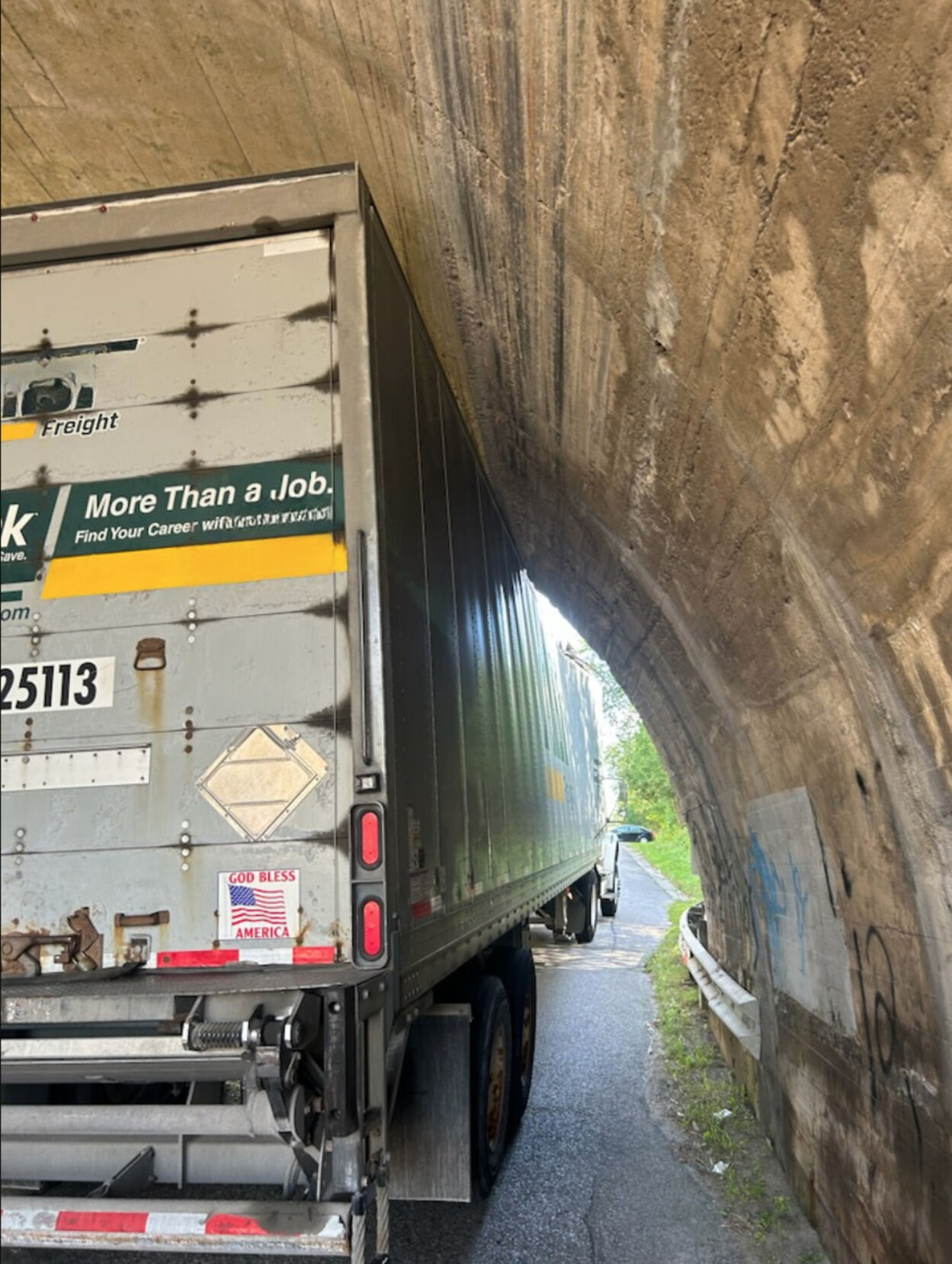 Newcastle road closed after truck stuck under bridge