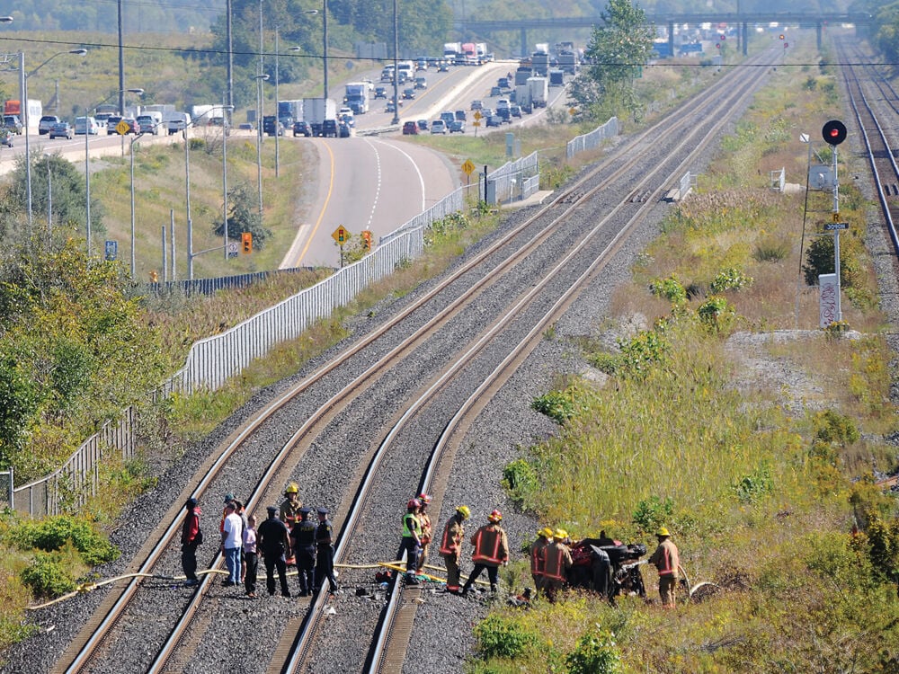 Car Flips Off Hwy. 401 Off-ramp And Lands On Railway Tracks