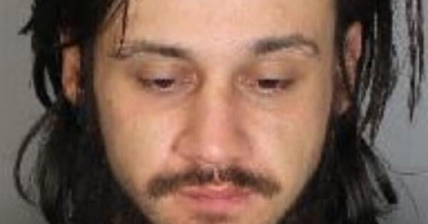 Police seek Oshawa man wanted on warrants for assault, firearms charges