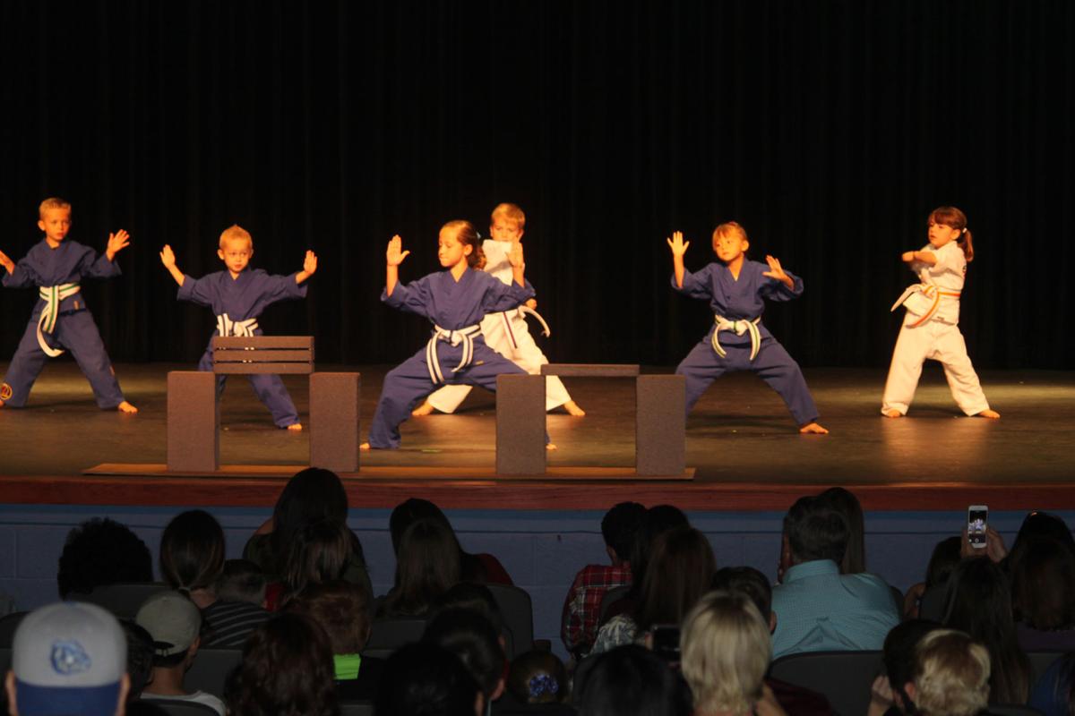 Extreme Martial Arts holds black belt graduation Local