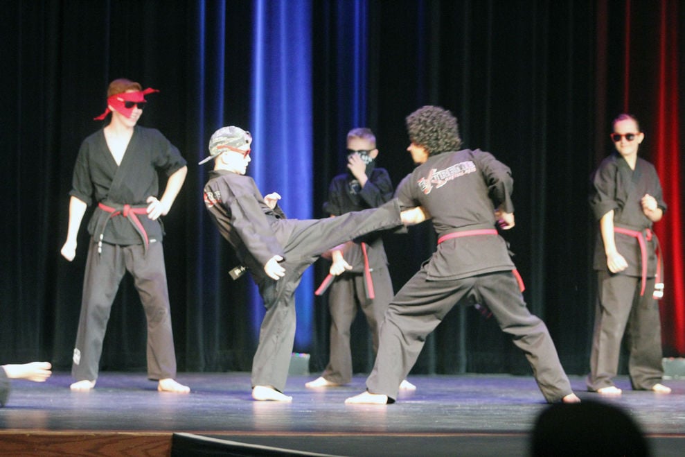 Extreme Martial Arts graduates 2019 black belts Local