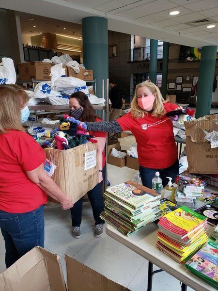 Santa helps Lawrence teachers give books, school supplies to needy students
