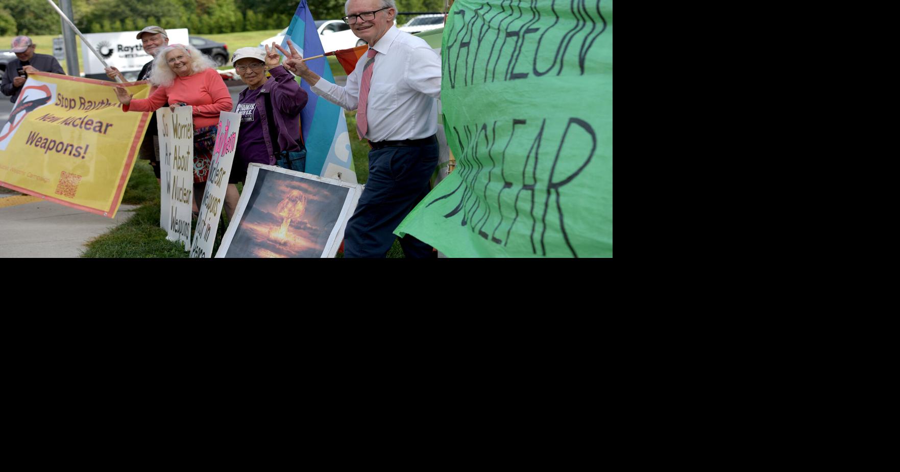 Protesters gather outside Raytheon