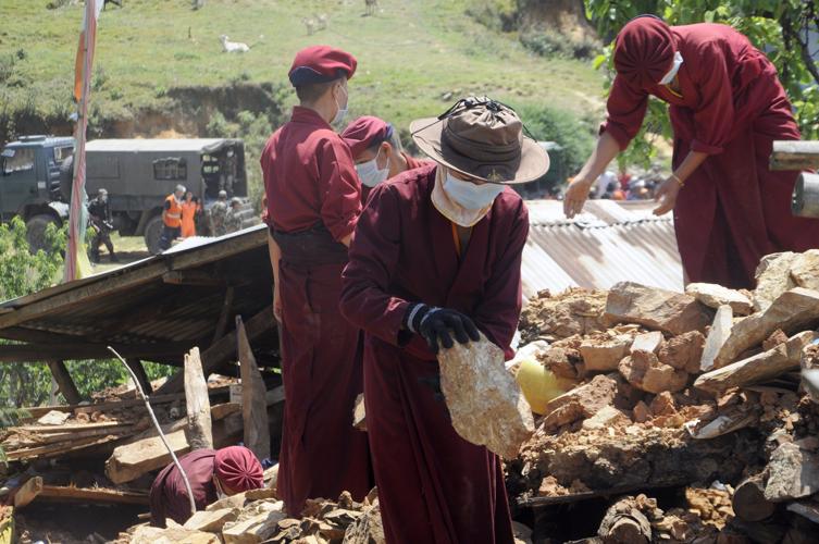 Devistation Examples 'Kung fu nuns' address Nepal devastation | Carriage Towne News ...