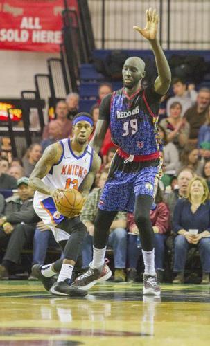 Tacko Fall and Tremont Waters of the Maine Red Claws pose for a