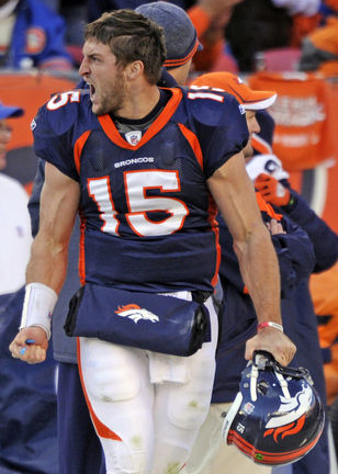 New York Jets Tim Tebow runs out of the pocket in the third