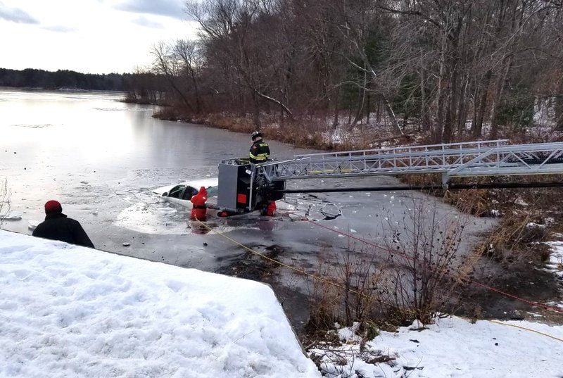 Police officers called heroes for rescuing woman whose car ...