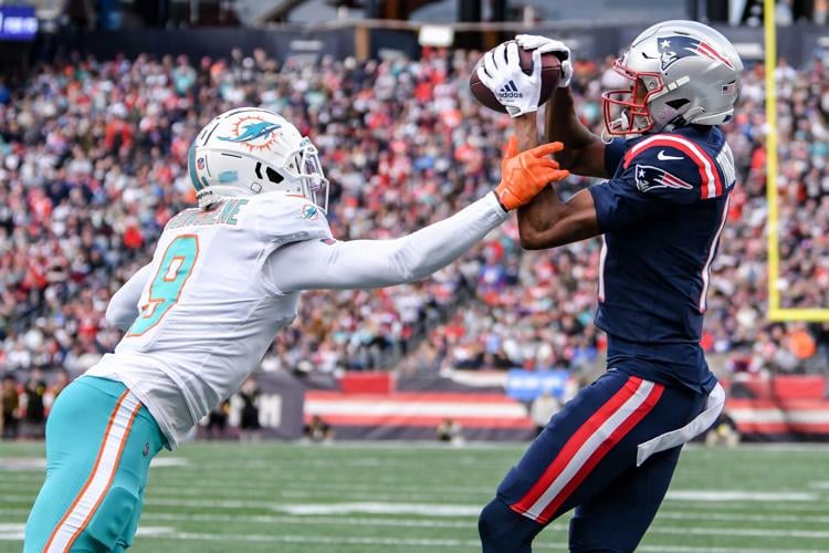SLIDESHOW: The New England Patriots beat the Miami Dolphins, 23-21